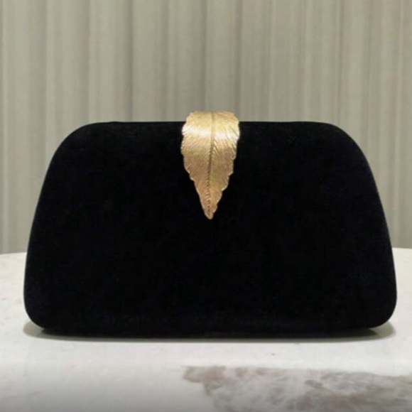 Elegant Black Clutch with Gold Leaf Accent